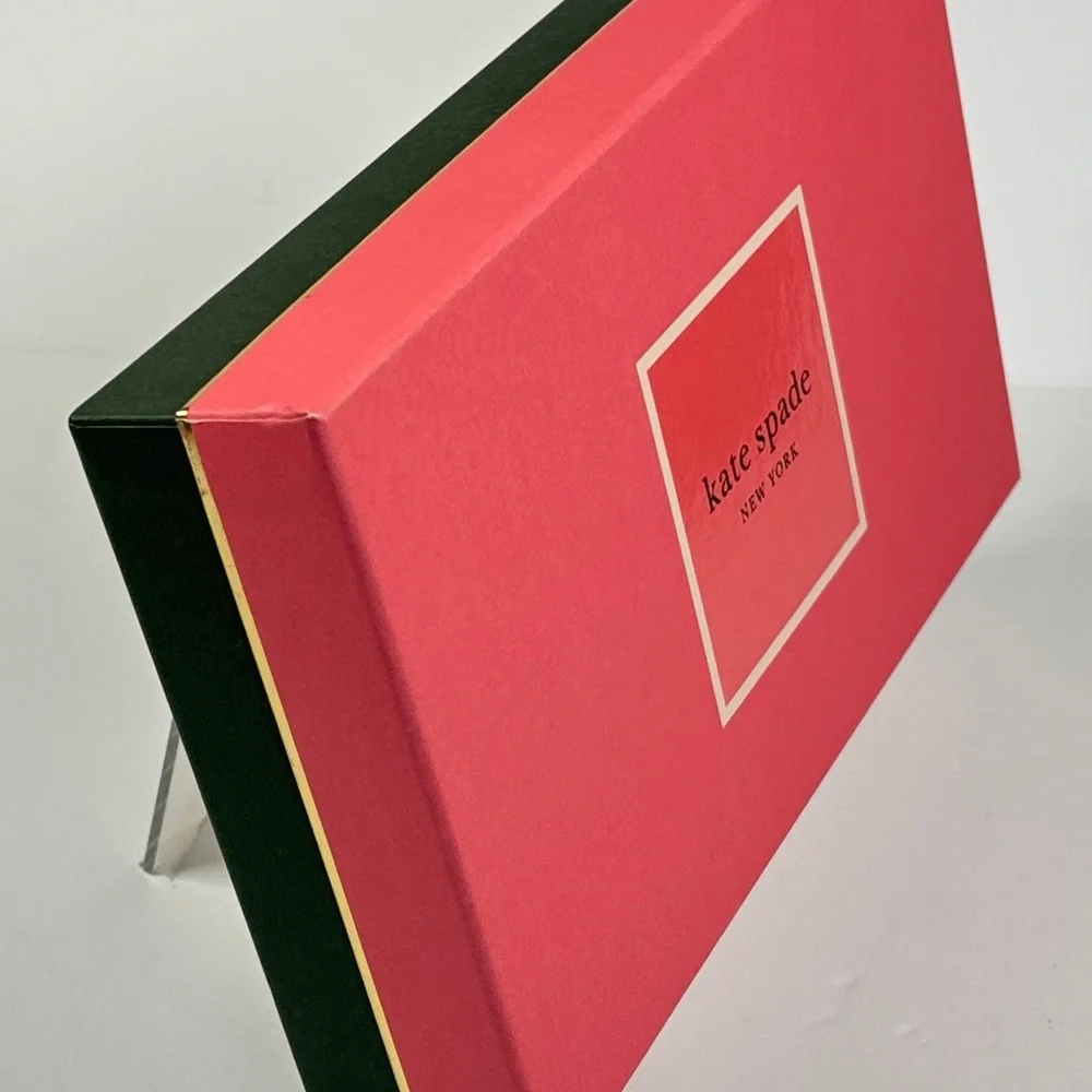 Kate Spade Pink box and green gift bag.